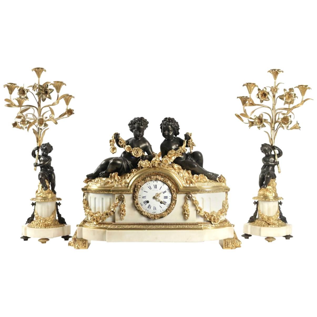 Important Mantle Clock with Matching Candelabras