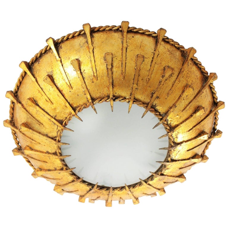 Brutalist Gold Leaf Gilt Iron Sunburst Wall Ceiling Light Fixture Brutalist Gold Leaf Gilt Iron Sunburst Wall Ceiling Light Fixture France 1950s For