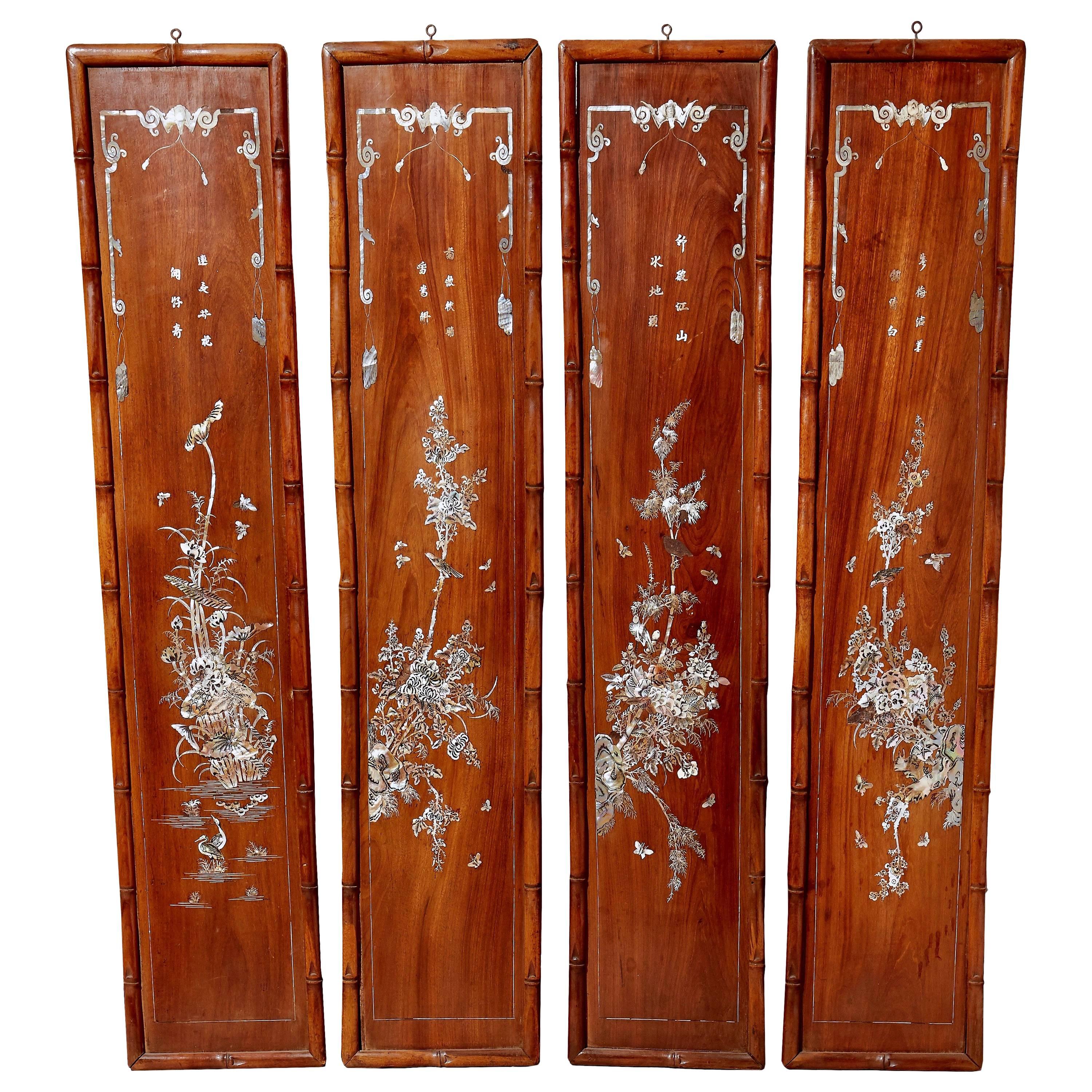 Set of Four Carved Asian Wood Panels with Mother of Pearl Inlays