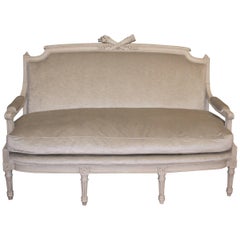Louis XVI Style Painted Settee Newly Upholstered in a Grey Velvet Chenille