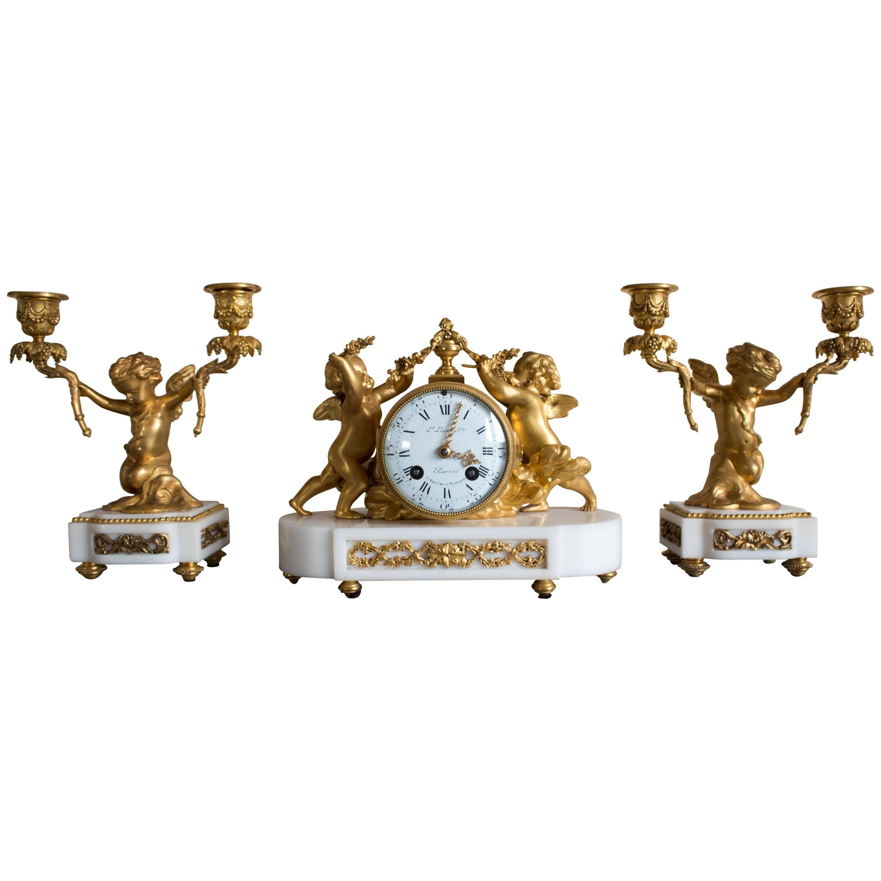 Antique French Gilt Bronze and Marble Clock and Candelabra Set For Sale