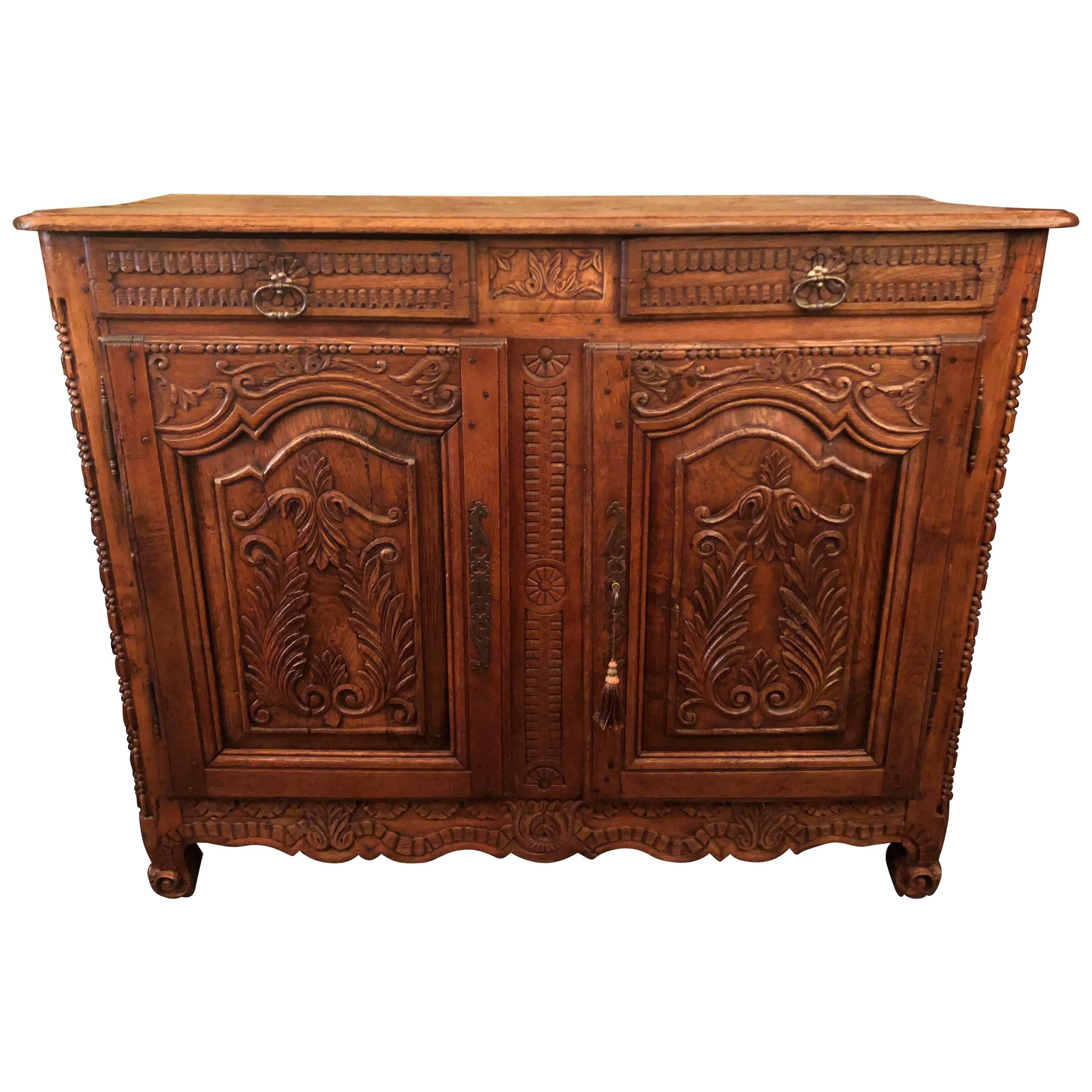 Antique French Carved Walnut "Brittany" Designed Buffet, circa 1830