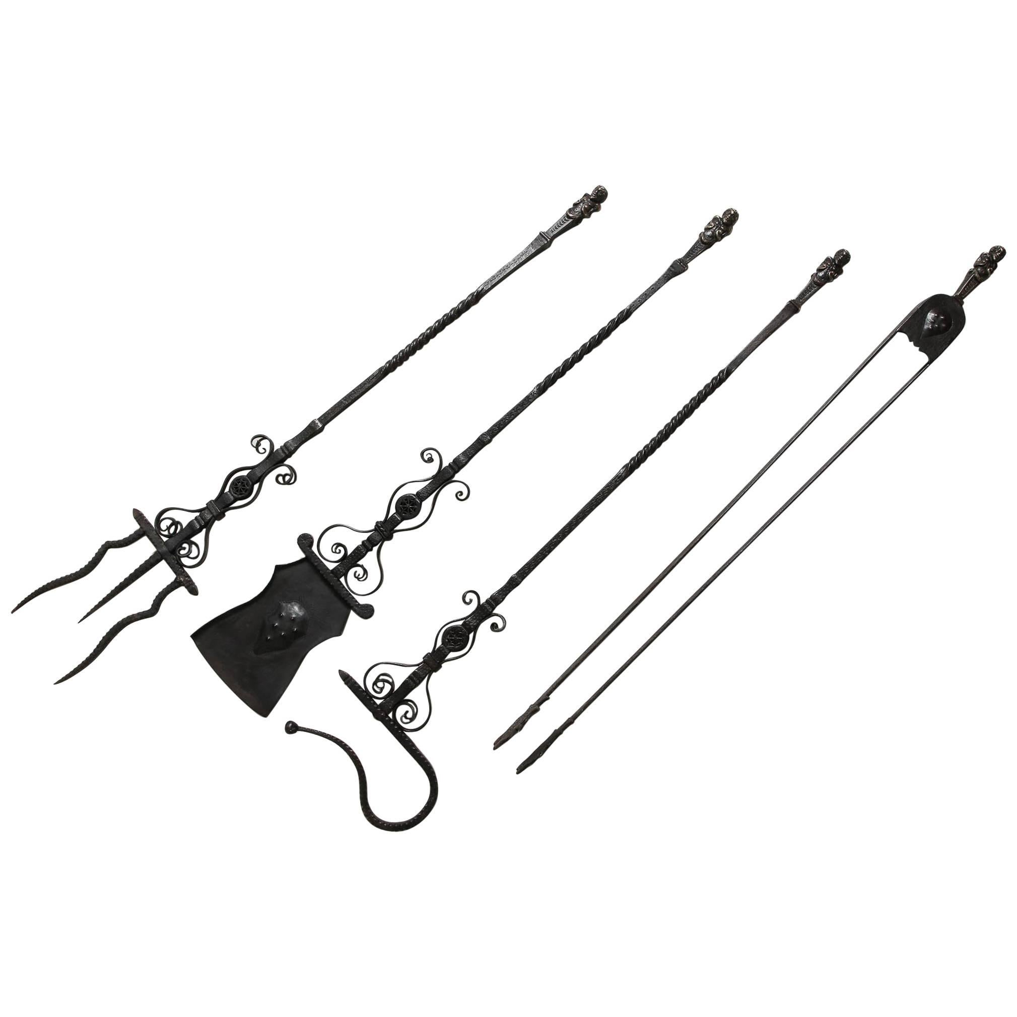 Important Set of Four Bronze and Wrought Iron Firetools