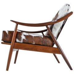 Restored Peter Hvidt Style Sloped Arm Black Walnut Lounge Chair in Cowhide