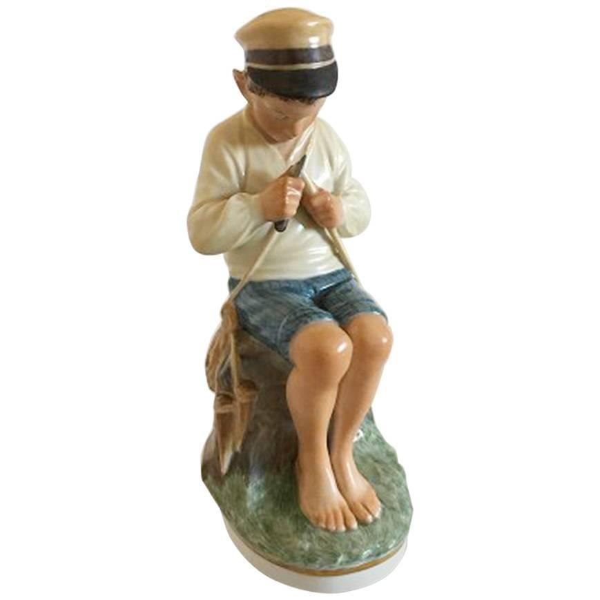 Royal Copenhagen over Glaze Figurine Boy Cutting Stick #905 For Sale