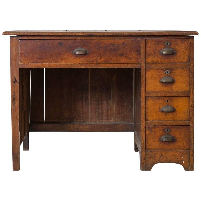 1920s Solid Oak Roll Top Desk with Recessed Panels and Five Drawers For