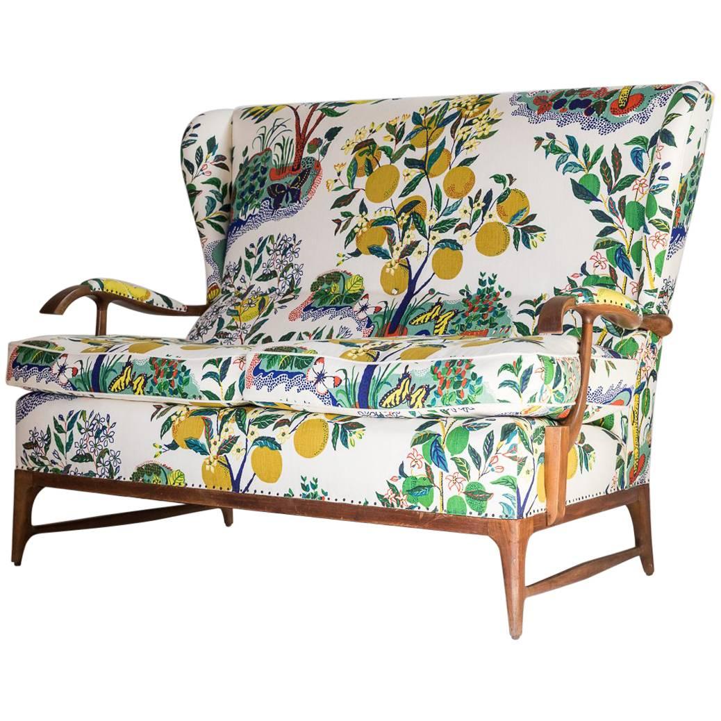 Vintage Wingback Settee Newly Upholstered in Colorful Josef Frank Fabric