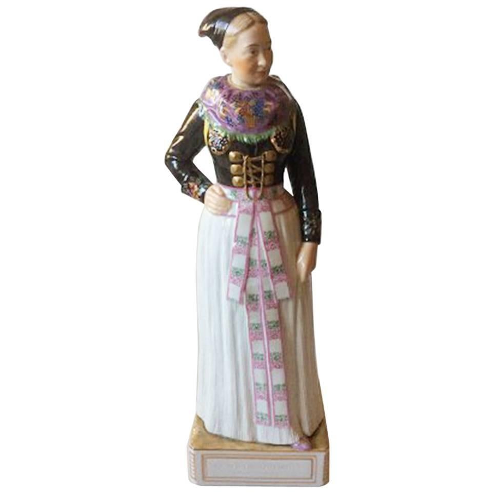 Royal Copenhagen Over-Glaze Figurine 12104 Cook's Costume, Amager Girl
