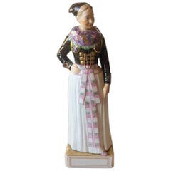 Royal Copenhagen Over-Glaze Figurine 12104 Cook's Costume, Amager Girl