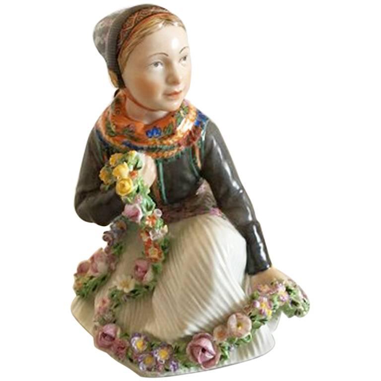 Royal Copenhagen Over-Glaze Figurine of Amager Flower Girl #12412