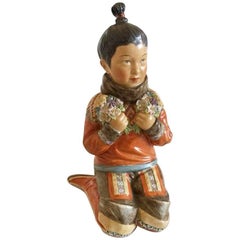 Royal Copenhagen Over-Glaze Figurine Greenland Girl #12415