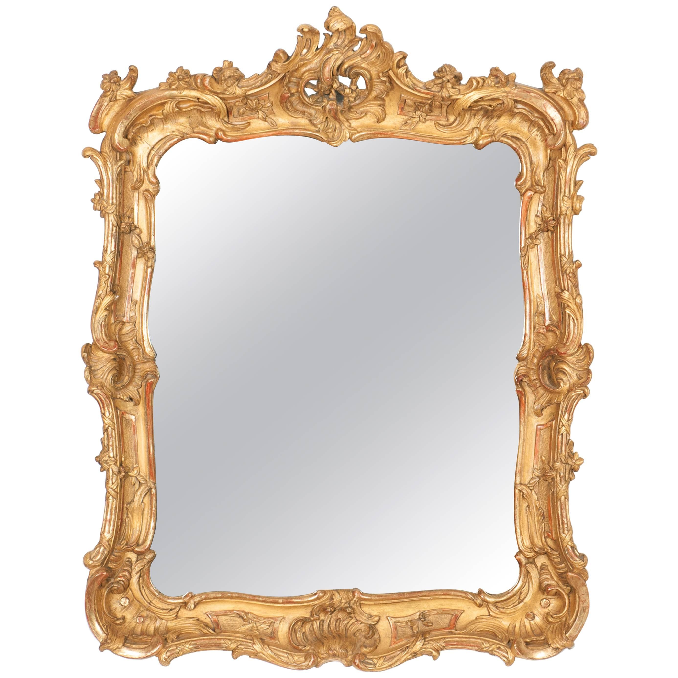 Louis XV Carved and Gilded Mirror with Carved Shell and Scrolls For Sale