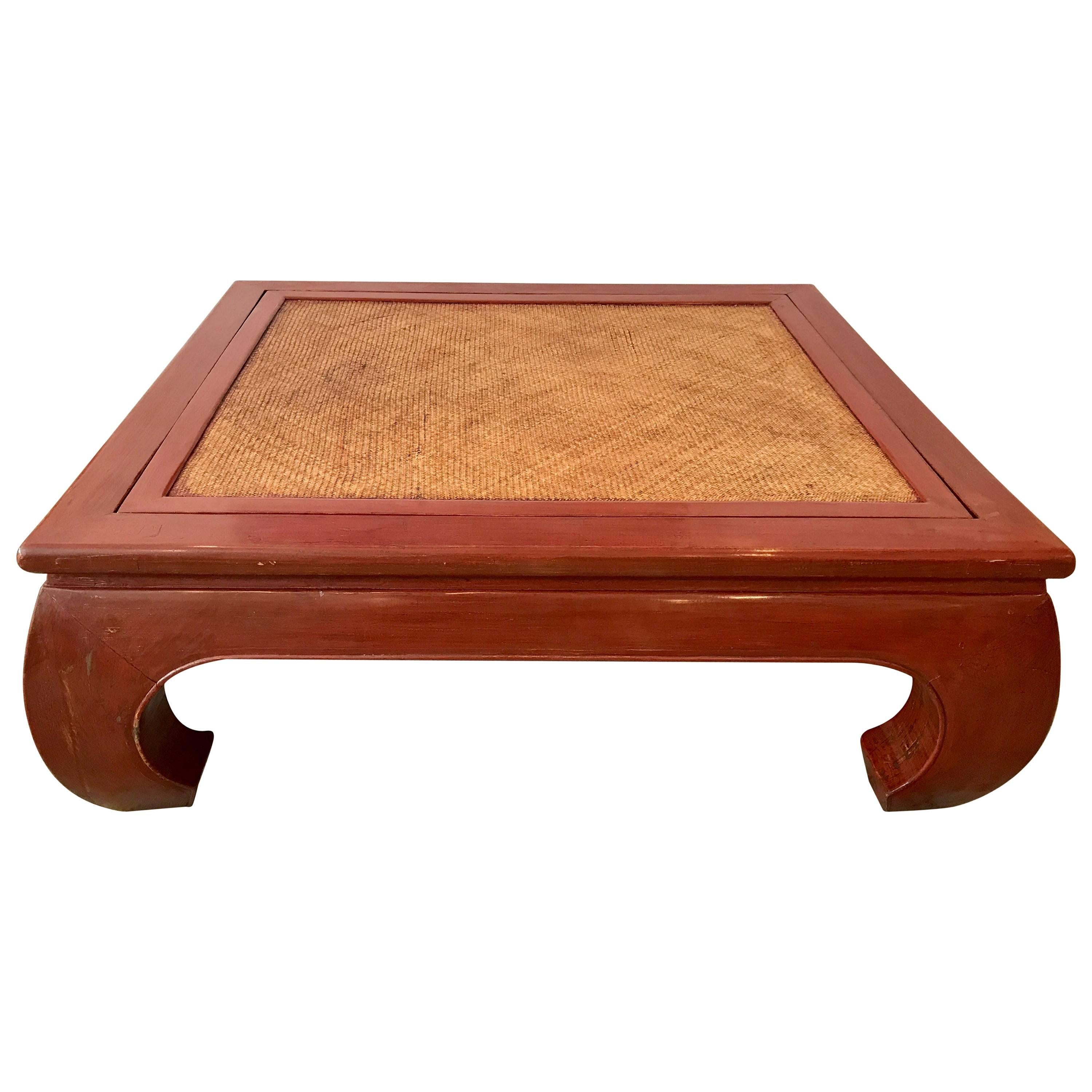 Massive Coral Red Chinese Chow Leg Coffee Table with Reversible Cane Top