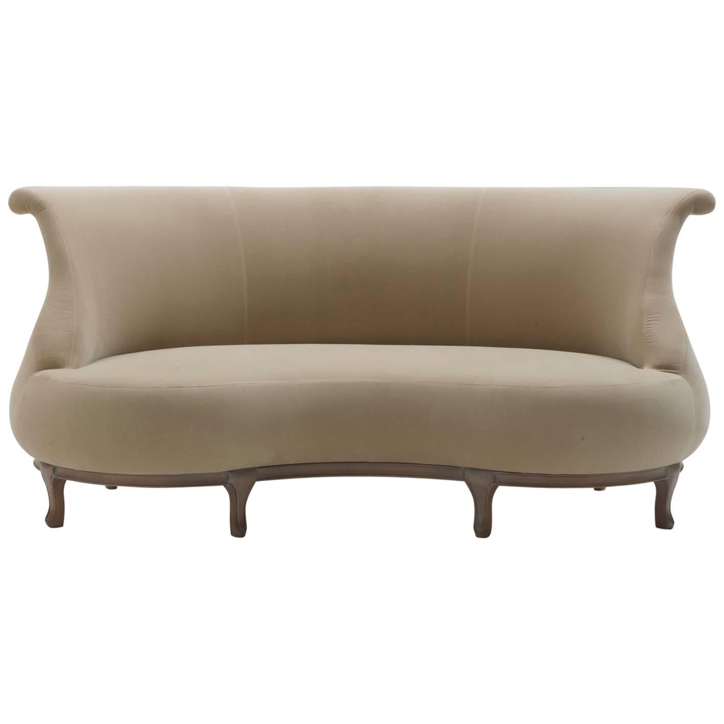 Plump -  solid walnut sofa, designed by Nigel Coates