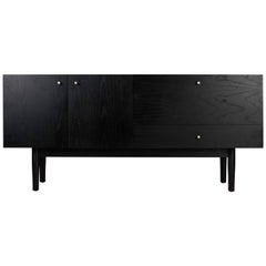 Rex Credenza in Ebony Ash with Hand-Machined Brass Pulls and Mirror Compartment