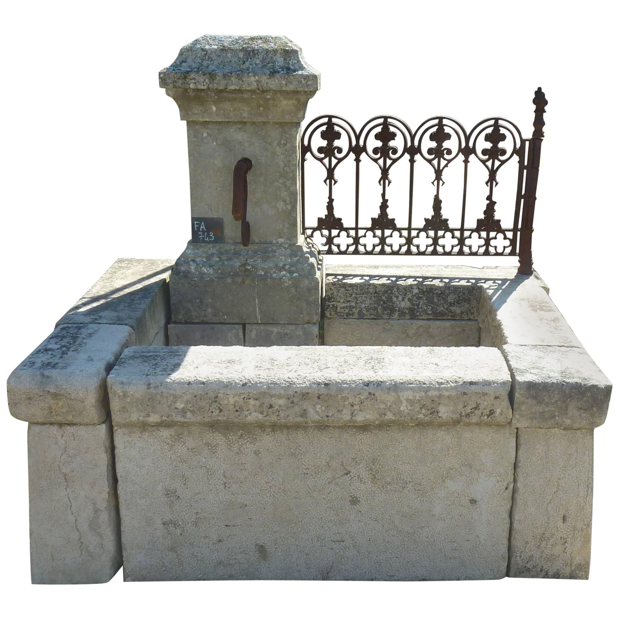 Wall Fountain of Provence in Patinated Natural Stone and Antique Wrought Iron For Sale