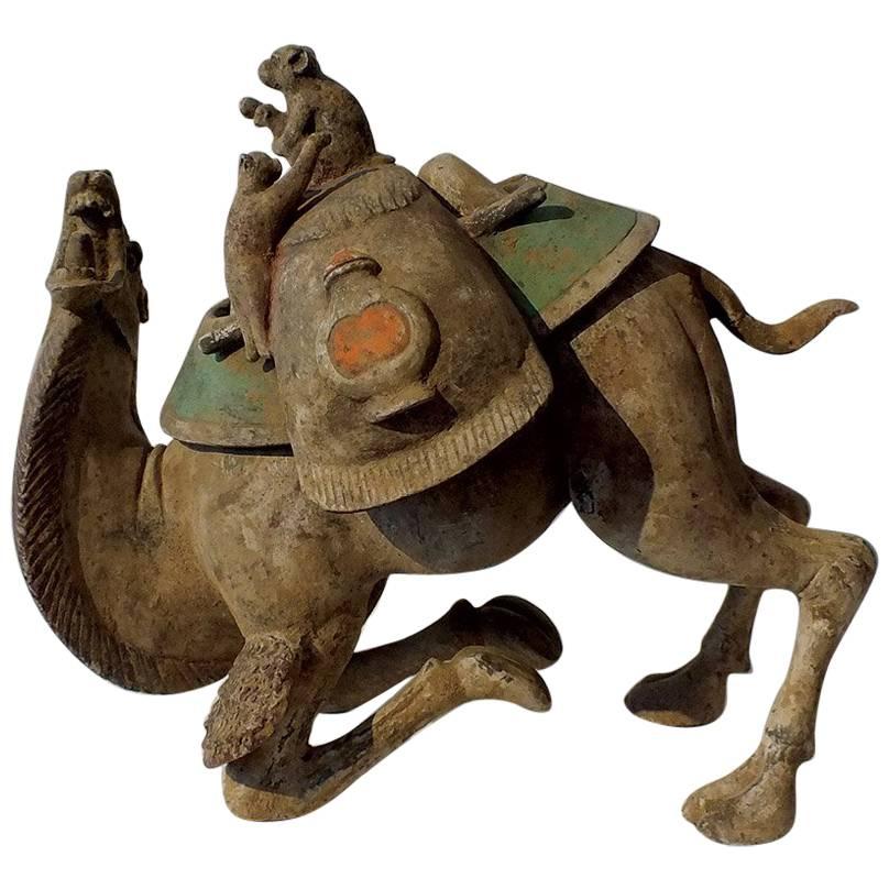 Exceptional Painted Pottery Figural Group of a Bactrian Camel