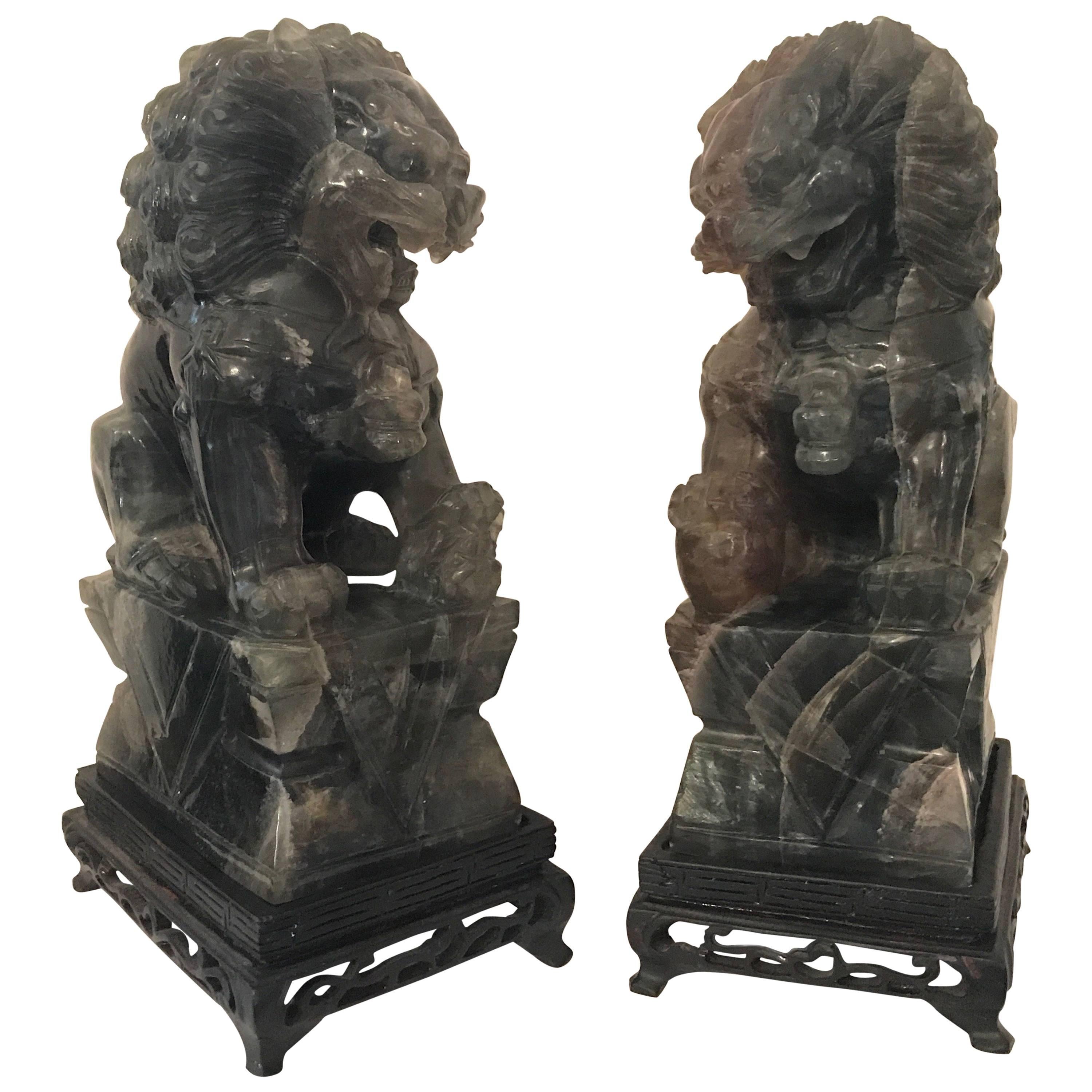 Pair of Chinese Carved Green Quartz Foo Dogs