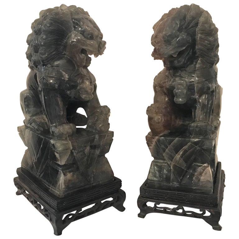Pair of Chinese Carved Green Quartz Foo Dogs at 1stDibs
