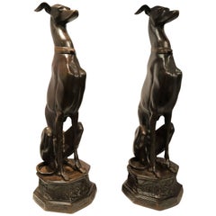 Pair of Almost Lifesize Patinated Bronze Dogs