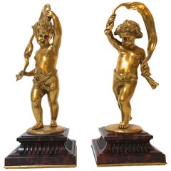 Pair of Napoleon III Gilt Bronze Sculptures of Putti
