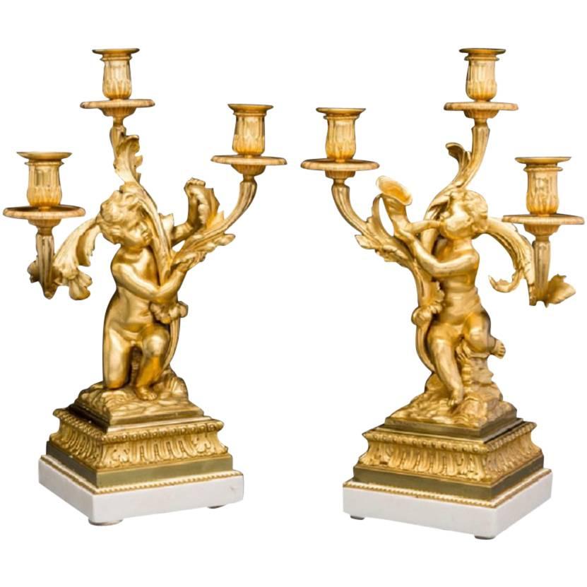 Pair of Bronze Dore and Marble Cherub Candelabras Signed Henry Dasson