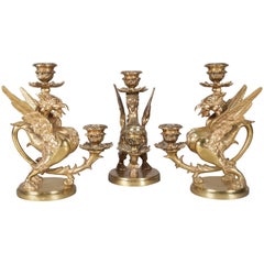 Set of Three French Figural Winged Griffon Gilt Bronze Double Candlesticks