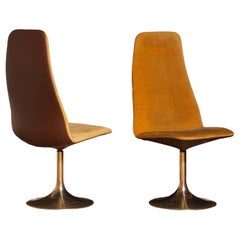 1970s, a Pair of Gold Velours and Brass Swivel Chairs by Johanson Design