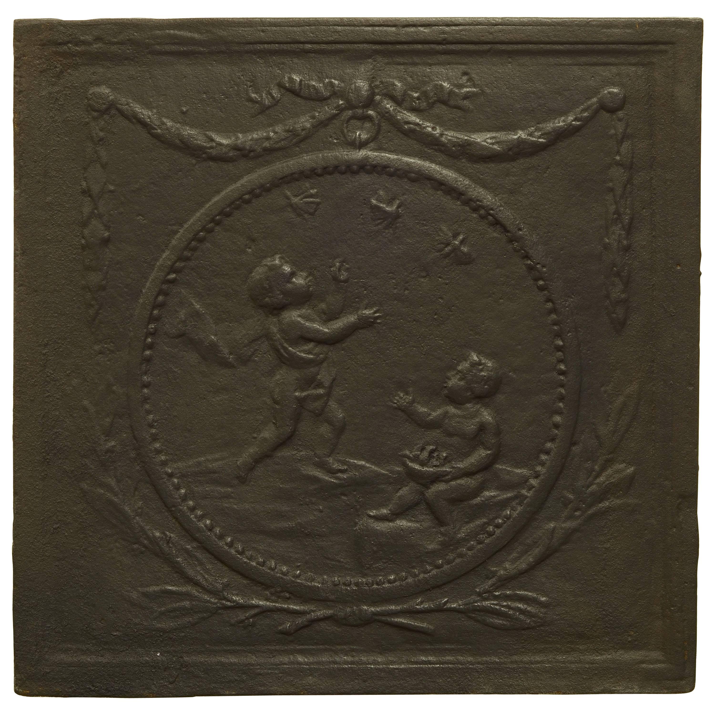 Antique Fireback with Two Cupids in a Circle