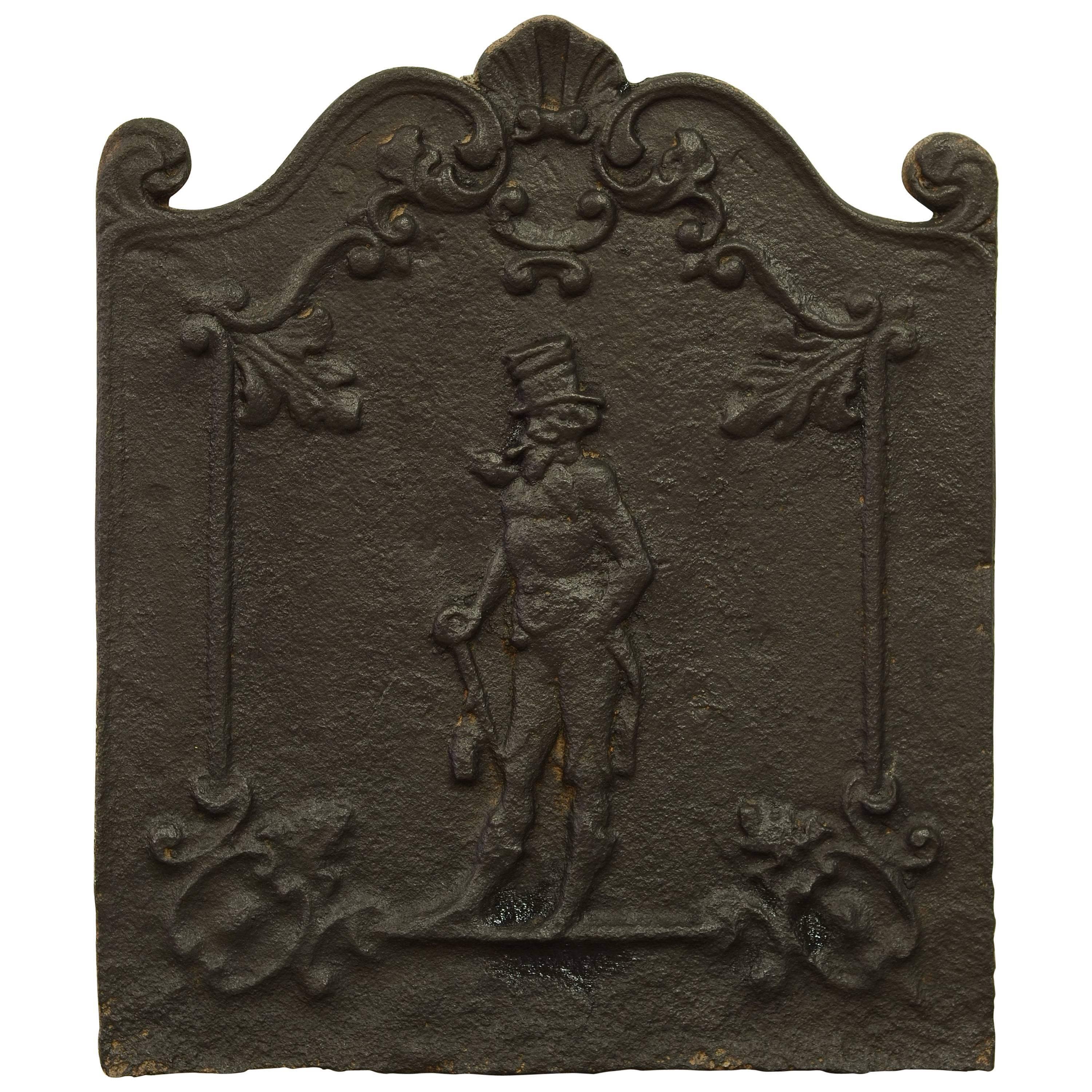 Antique Decorative Fireback Displaying a Man with a "Top Hat"
