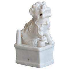 Antique Moulded Miniature Blanc de Chine Porcelain Figurine of a Foo Lion Kangxi