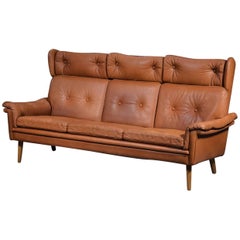 Sven Skipper 1960s Danish Three Person Coupe Wingback Sofa in Cognac Leather