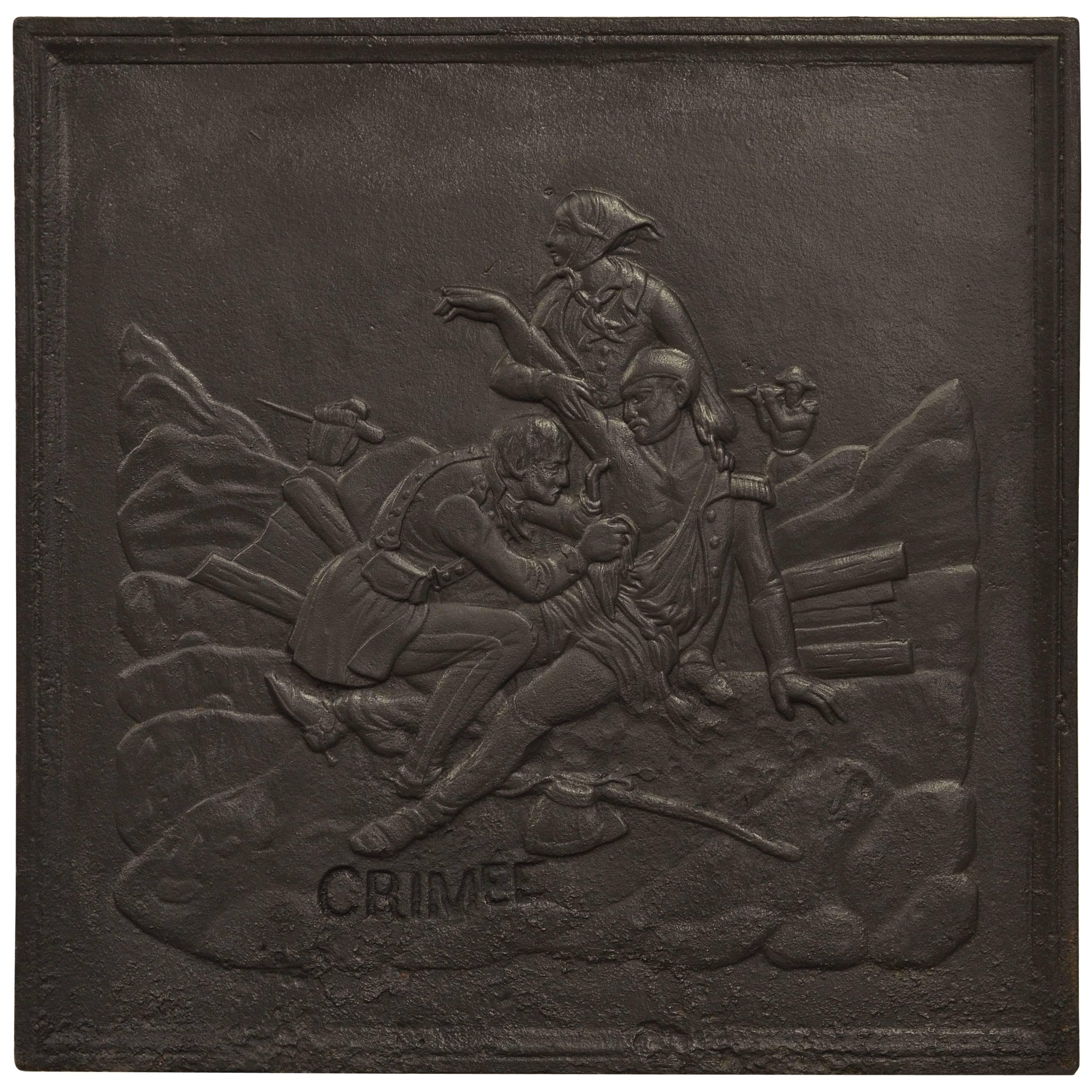 Plaque de cheminée ancienne montrant la bataille de Crimée