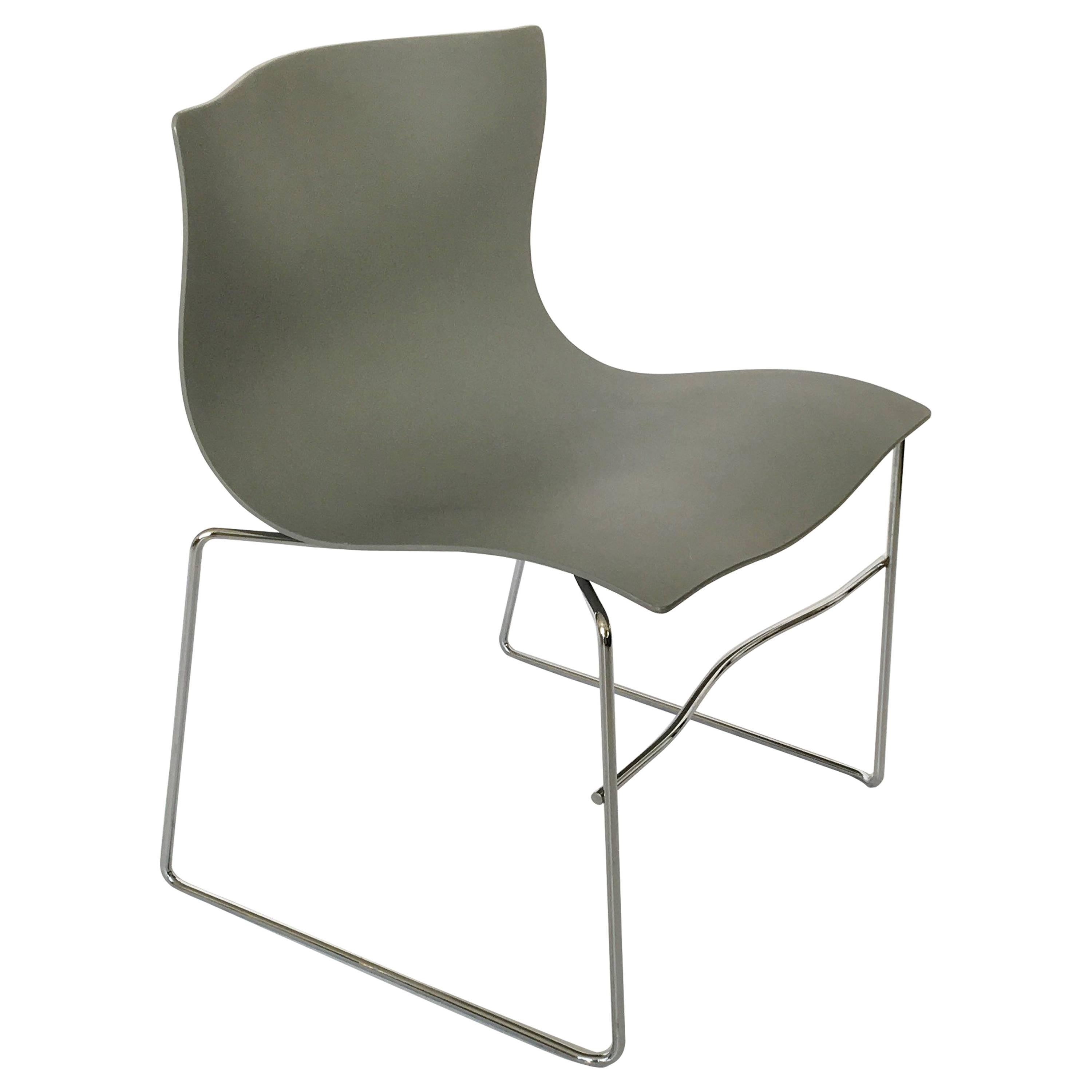 Twenty (20) vintage modernist stackable “Handkerchief” chairs by designer Massimo Vignelli for Knoll. It features a seat in one molded piece of metal, “intended to evoke the windblown contours of a handkerchief floating through the air”, with a gray