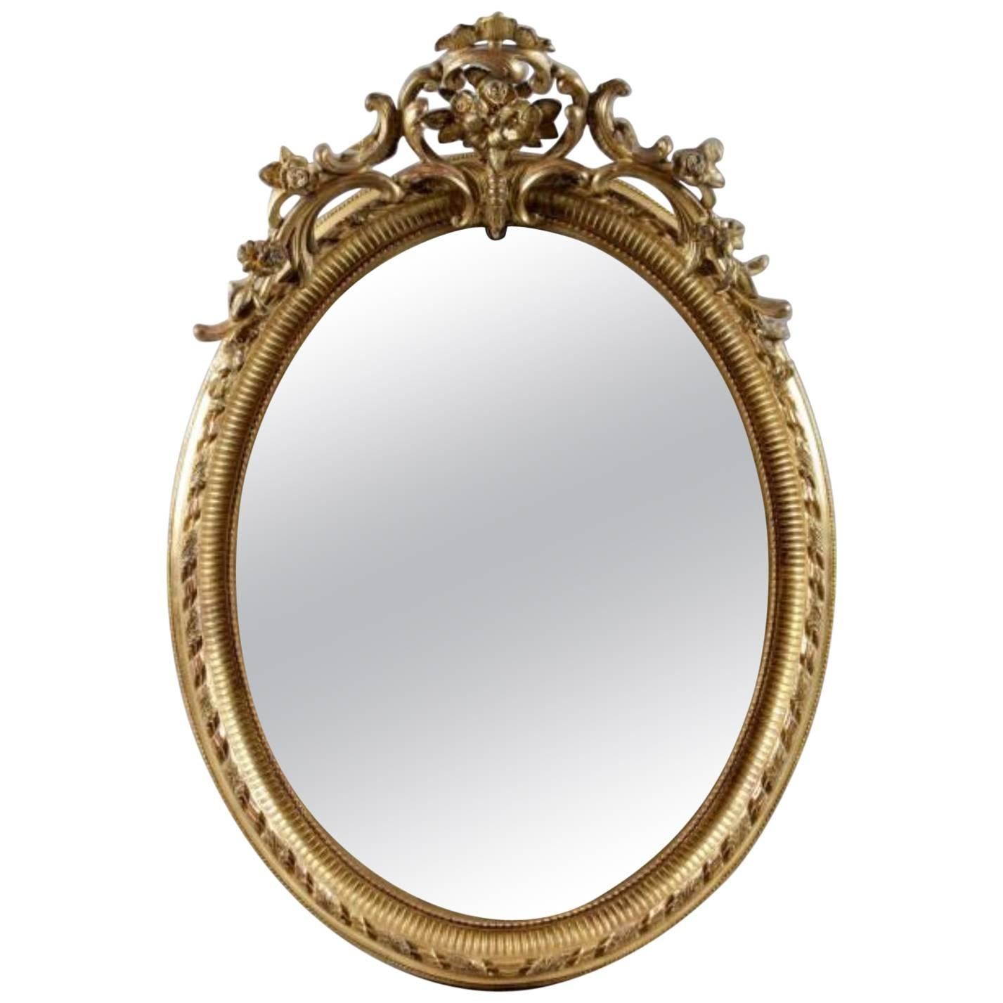 Fine 19th Century French Oval Mirror of Napoleon III Period in Carved Giltwood For Sale