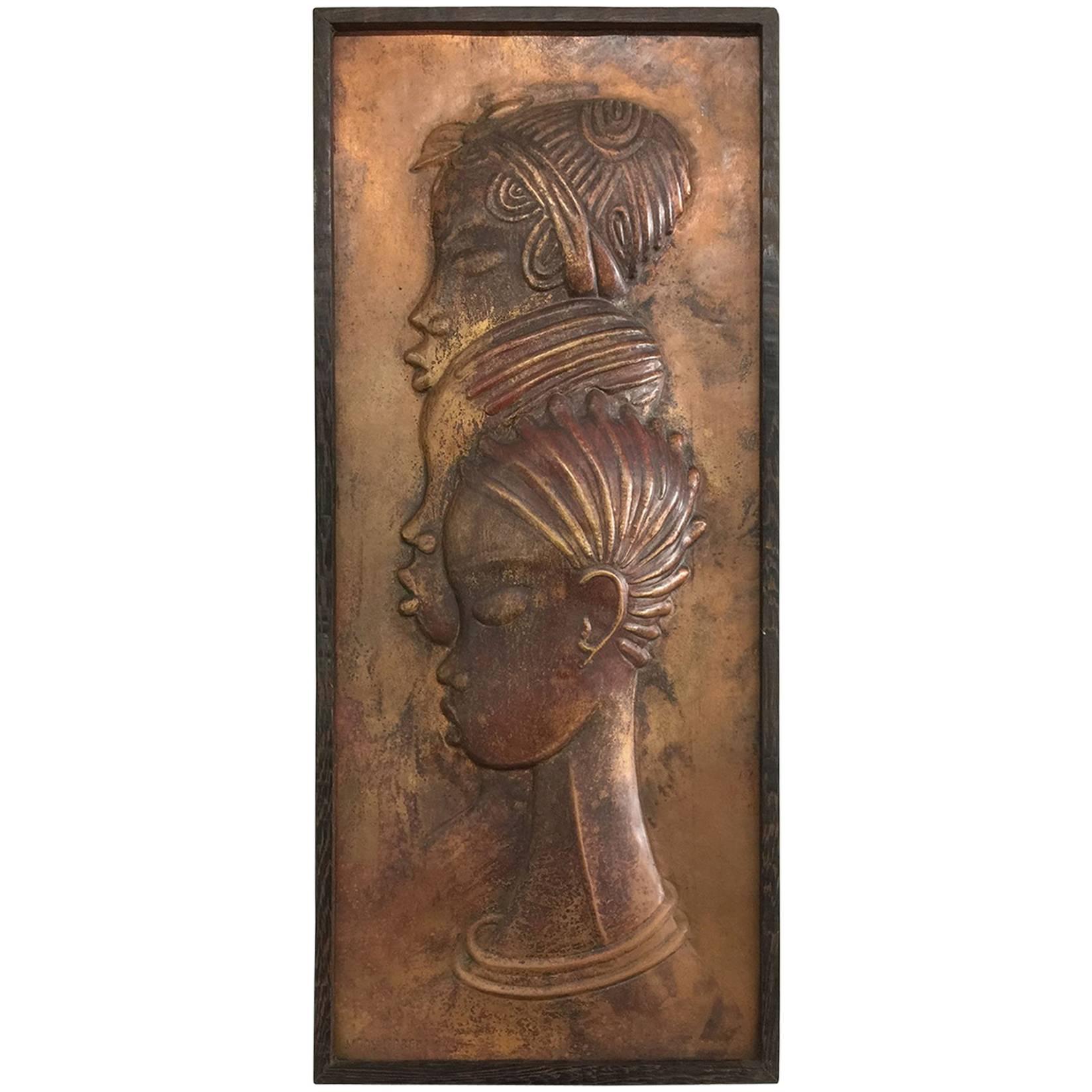 African Art by Ngoy Kabem, Sadi M, Three Heads of Woman relief in Brass, 1979