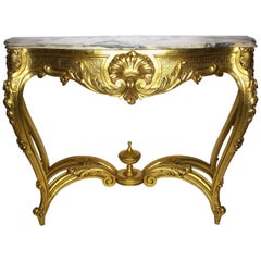 Table console française de style Louis XV en bois doré sculpté avec plateau en marbre