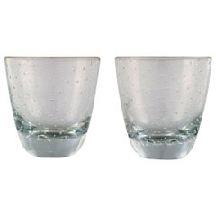 Gunnel Nyman for Nuutajärvi. Two vodka glasses in clear art glass.