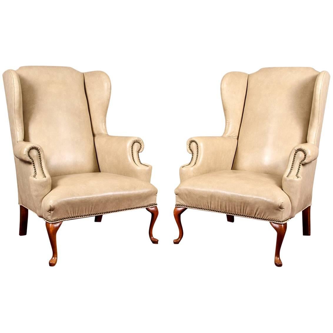 Pair of Tan Faux Leather Wing Chairs