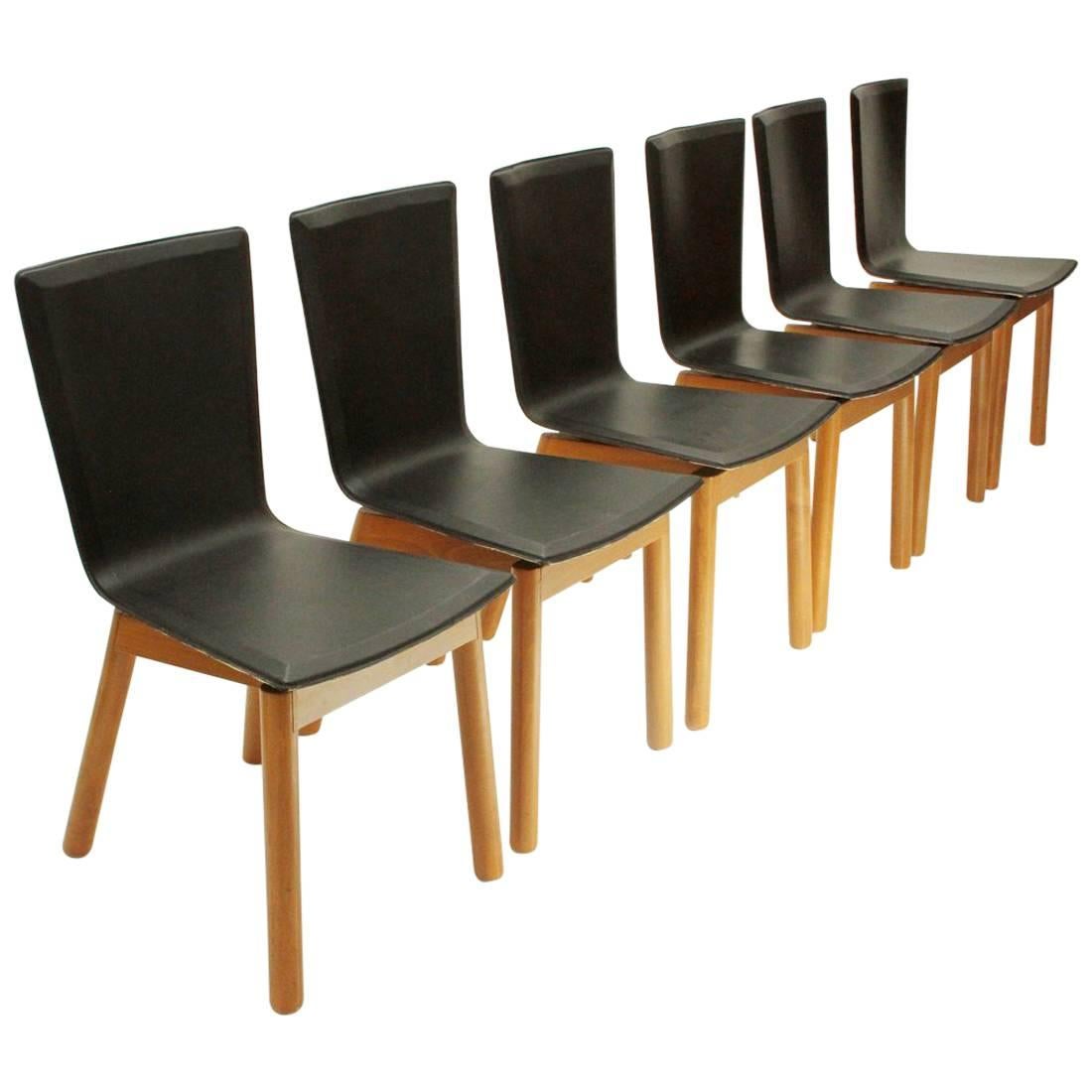 Six Italian leather chairs, 1980s For Sale