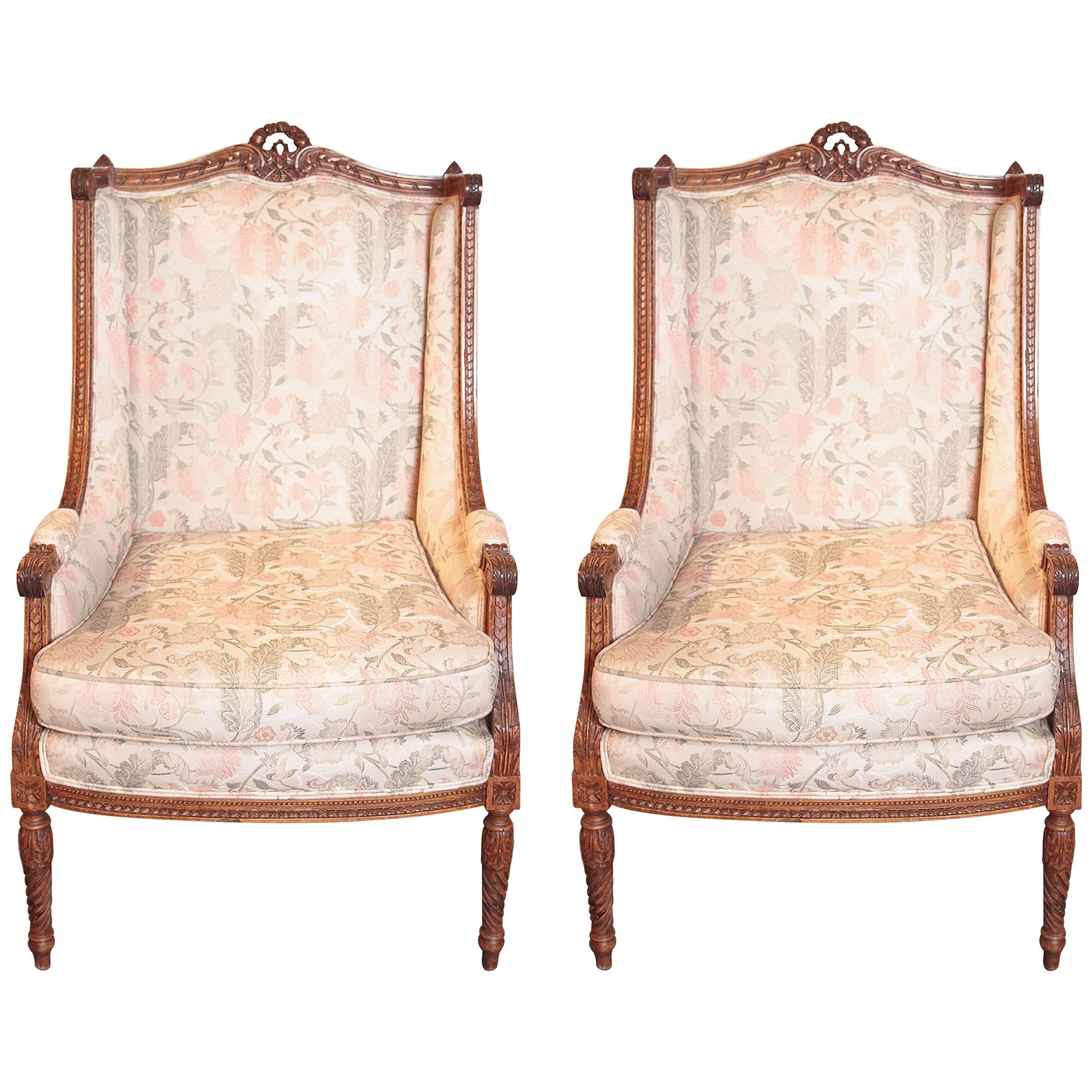 Pair of Late French Louis XVI Fruit Wood Carved Bergeres