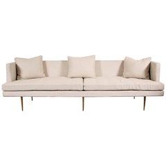 Contemporary Modern Upholstered Sofa with Tall Brass Legs