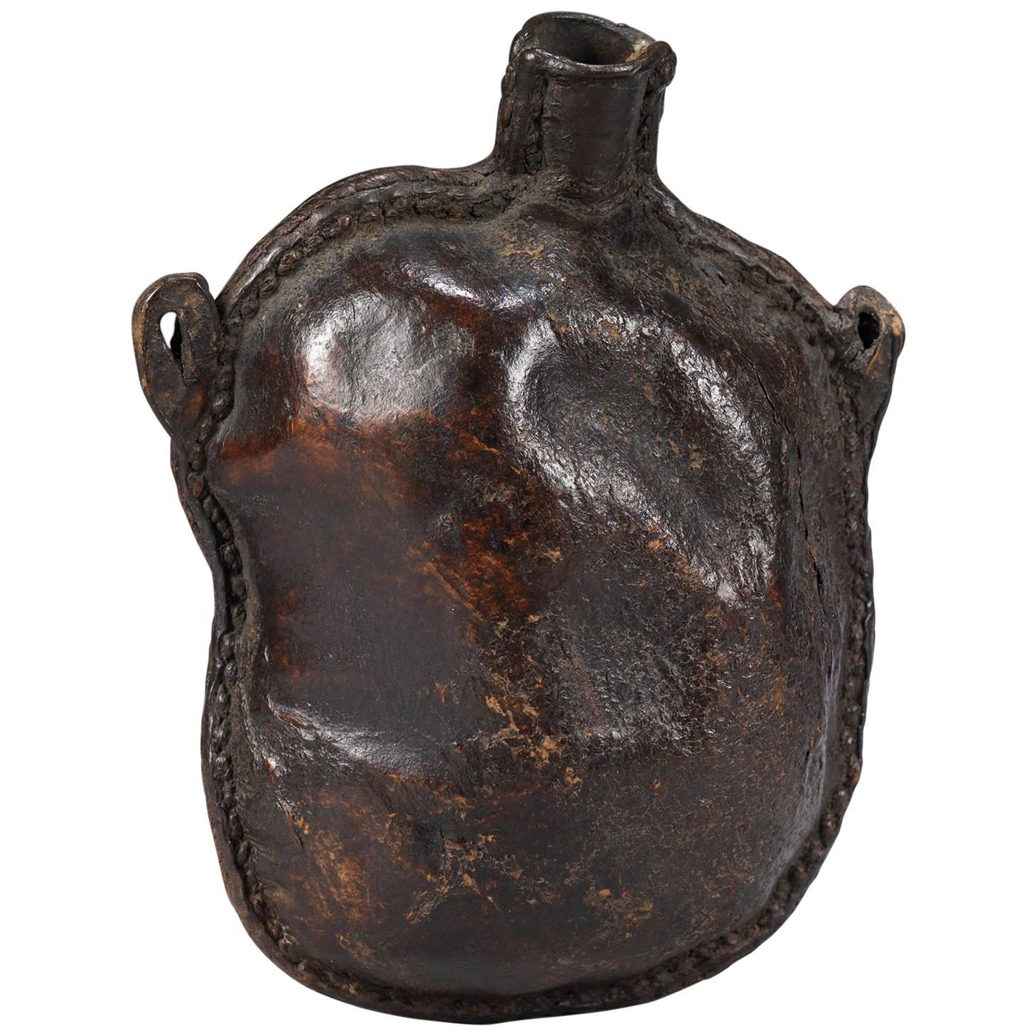 Richly Patinated Early Spouted Drinking "Bottle" For Sale