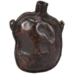 Richly Patinated Early Spouted Drinking "Bottle"