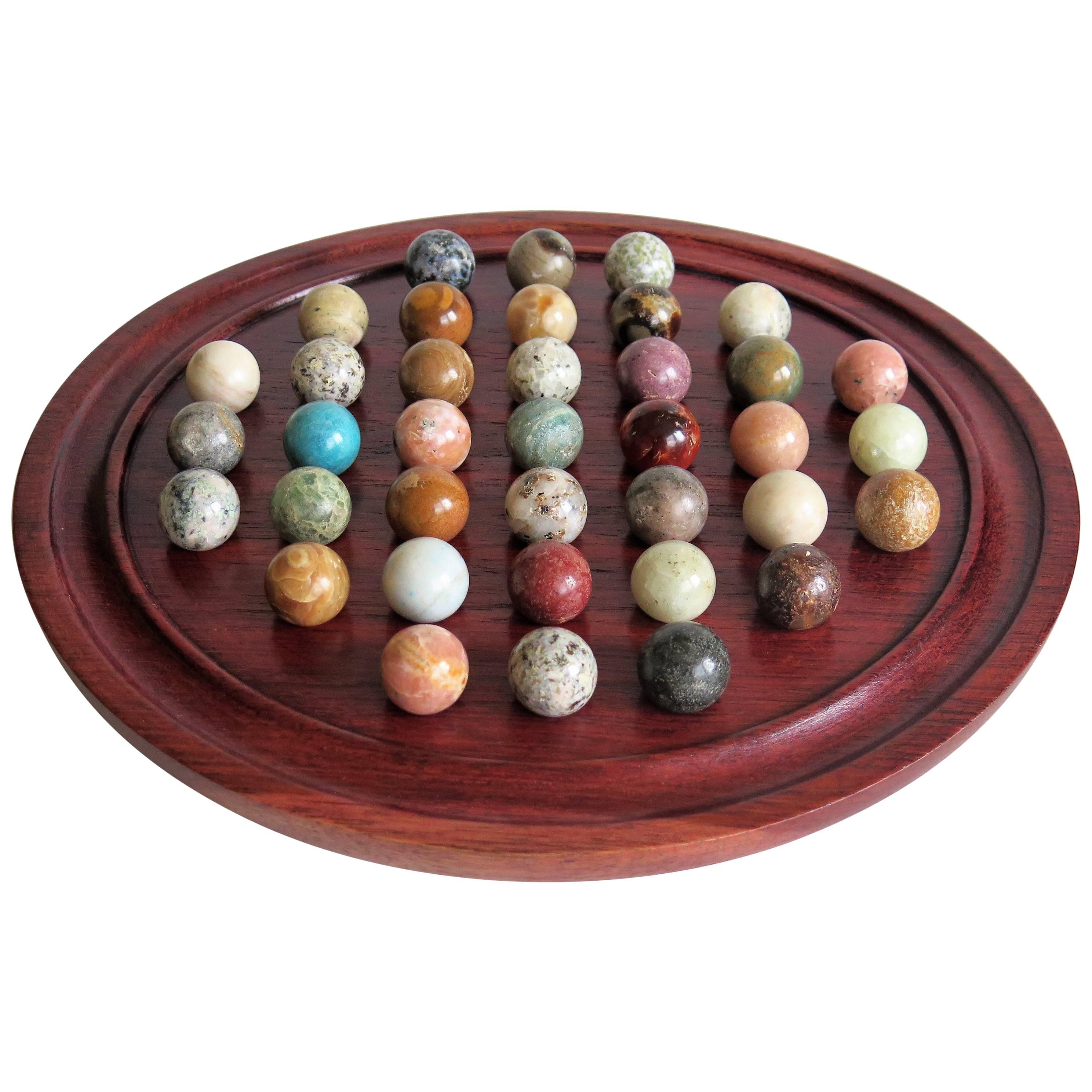 Edwardian Marble Solitaire Board Game with 37 Agate Stone Marbles, circa 1910