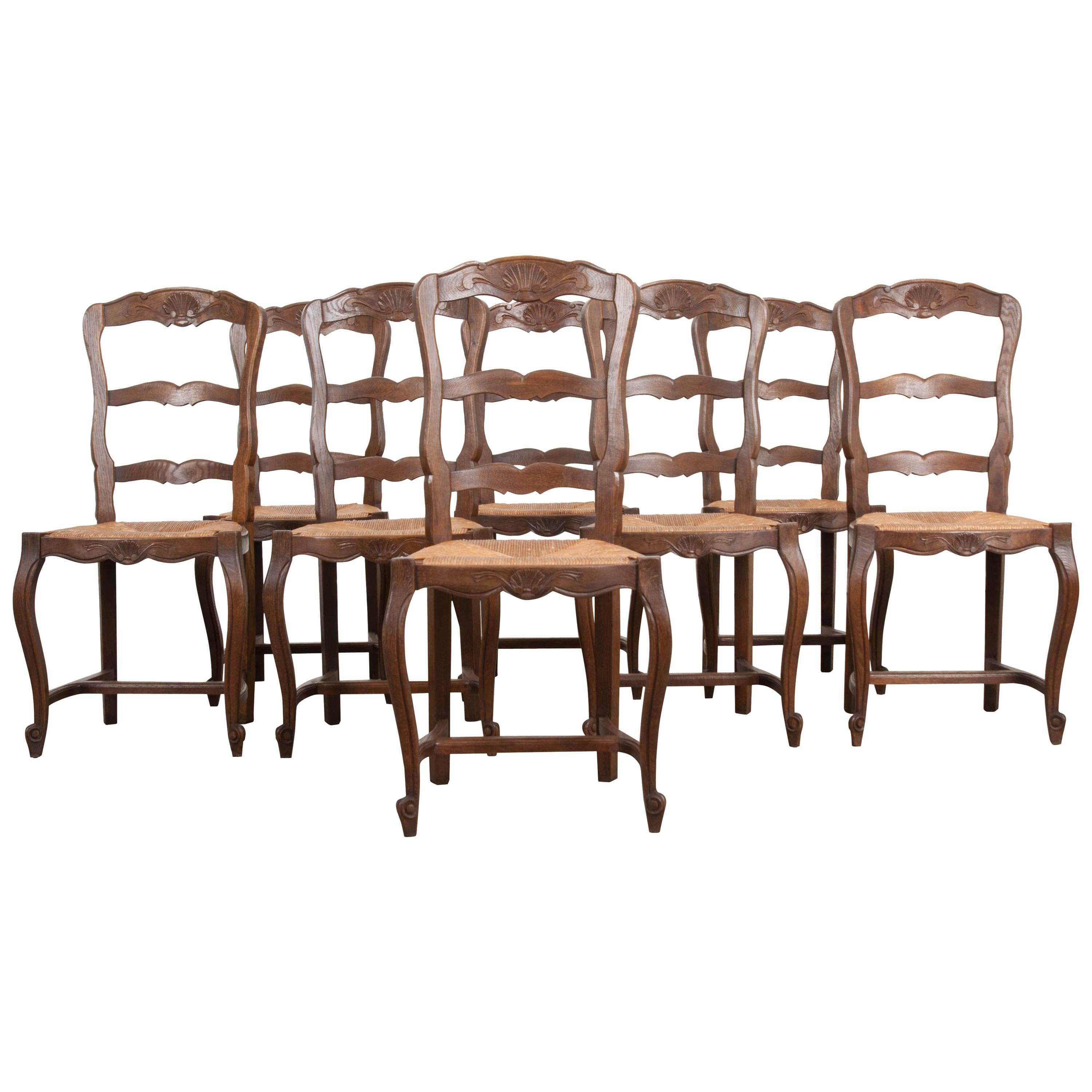 Set of Eight French Oak Ladder Back Chairs with Rush Seats