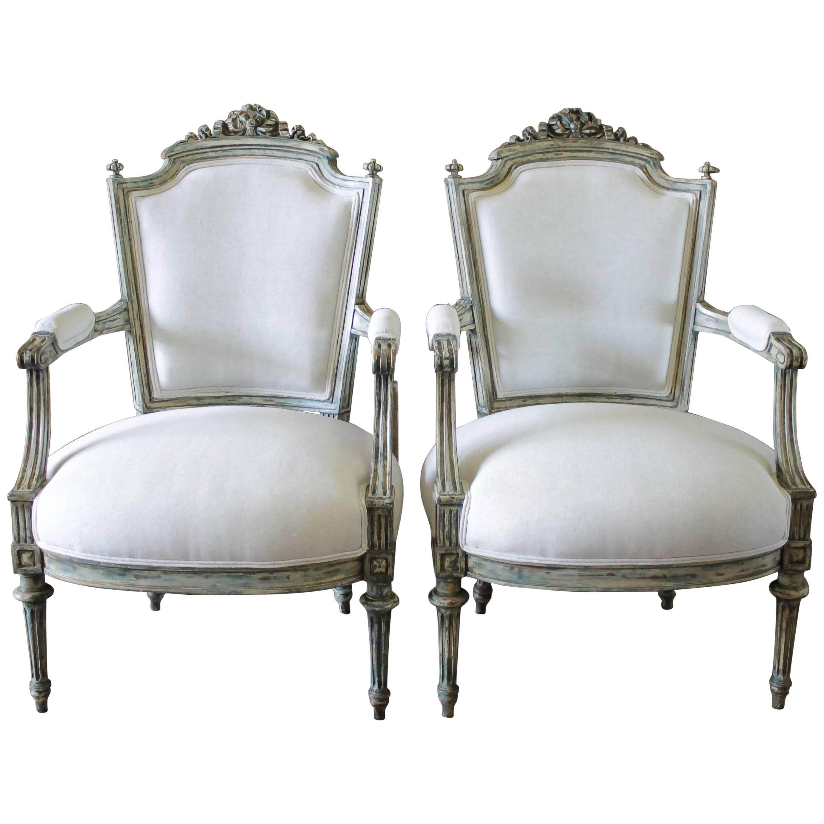 Pair of 19th Century Painted and Upholstered Louis XVI Style Open Armchairs