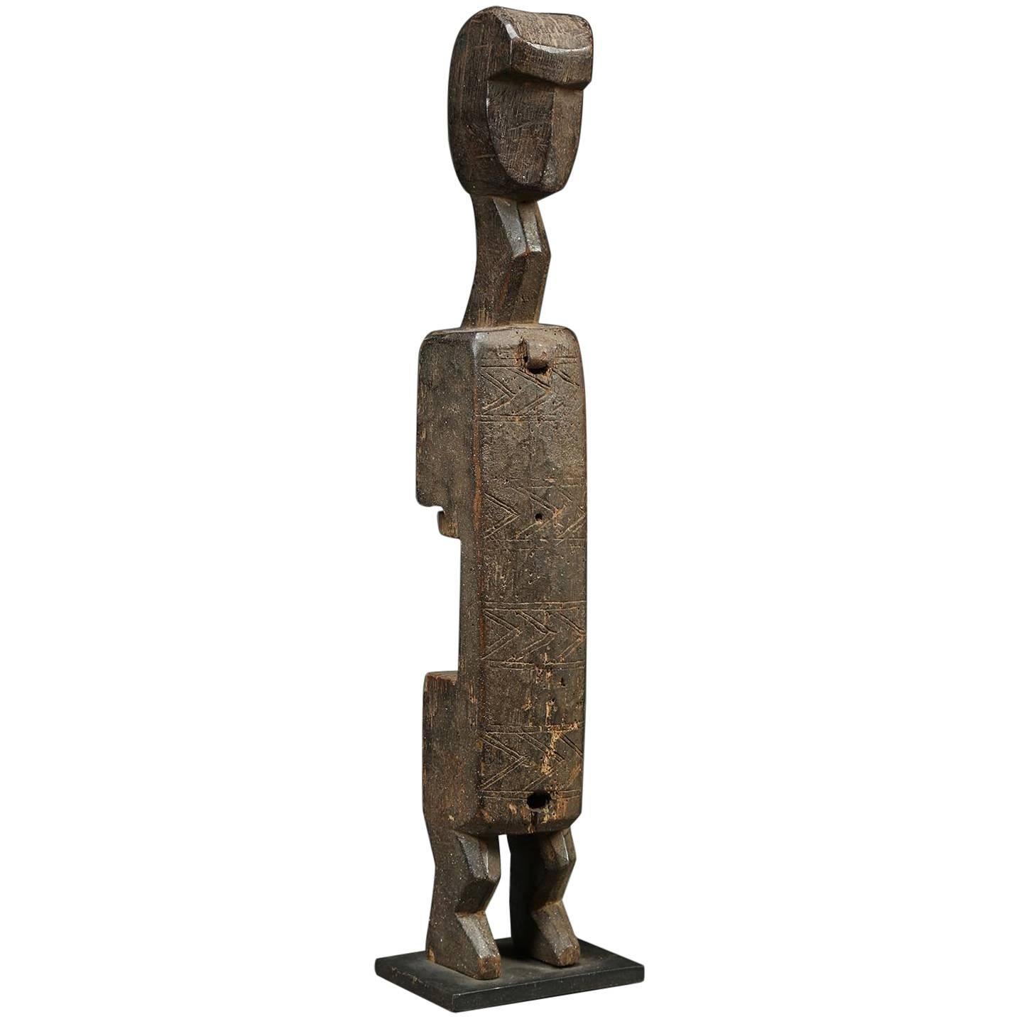 Fine Tribal Bambara cubist figurative wood door lock, early 20th century Mali, Africa great abstract figure with strong cubist stylized elegant face. 
The Bambara of Mali use decorated door locks sliding horizontal bar and with a removable key