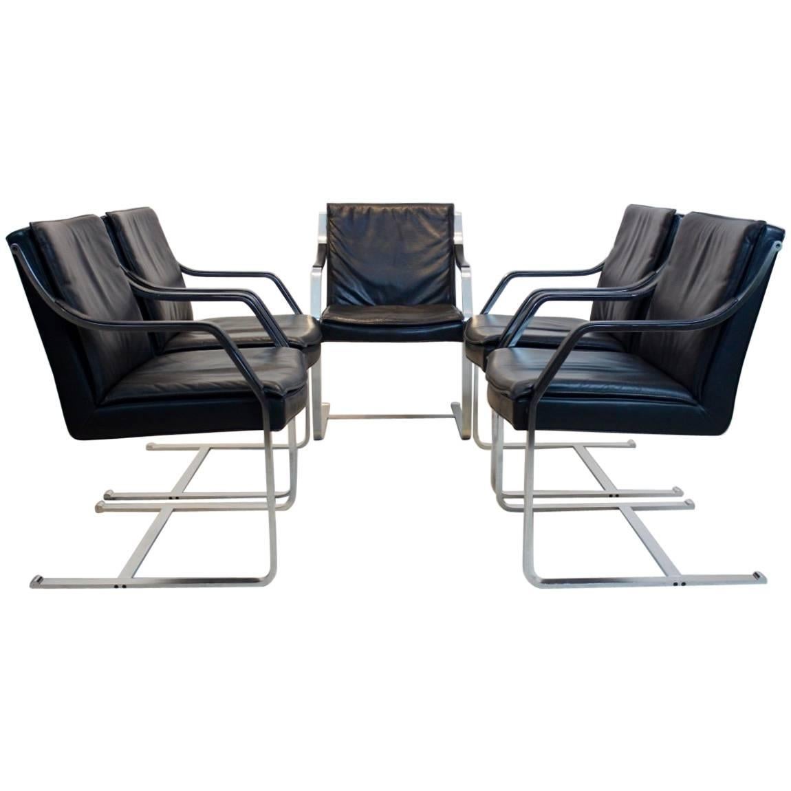 The graceful Art collection chair is an icon with a marvellous sit. Heavy stainless steel brushed frame with classic black leather upholstery. This cantilever chair was designed by Rudolf B. Glatzel in the 1980s for Walter Knoll as part of the Art