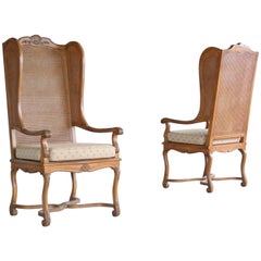 Paar Hollywood Regency Cane Wingback Chairs aus den 1920er Jahren